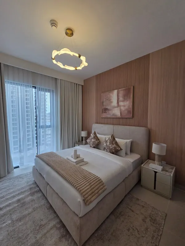 Bedroom with wood feature wall