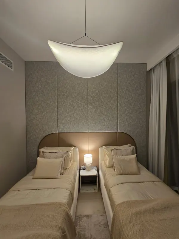 Furnished studio bedroom by Nuwah Interiors